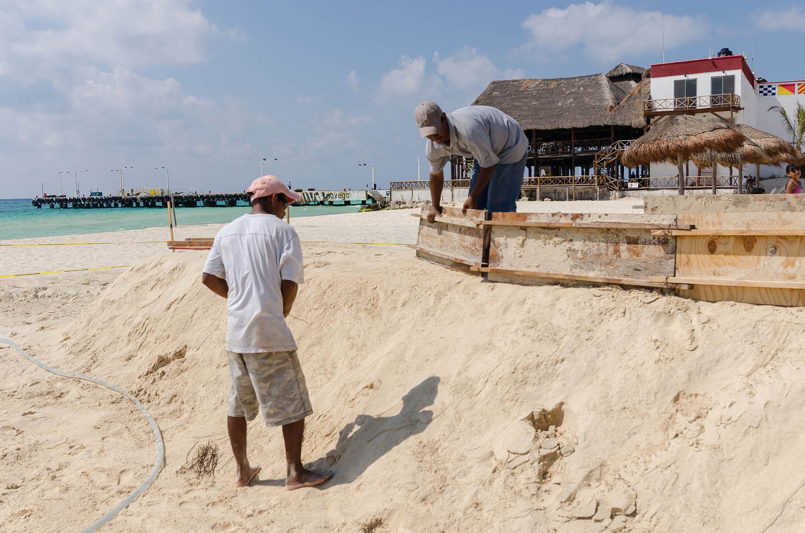 building sandcastles in Playa del Carmen